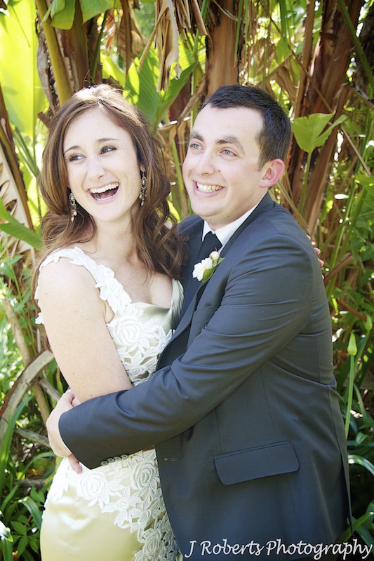 Laughing bride and groom - wedding photography sydney